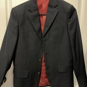 Classic Black Suit with Notched Lapel and Textured Fabric